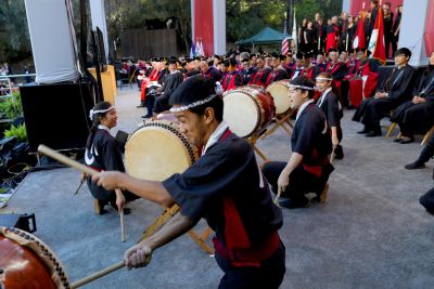 Stanford Taiko performing to the left of the main stage in Frost Amphitheater.