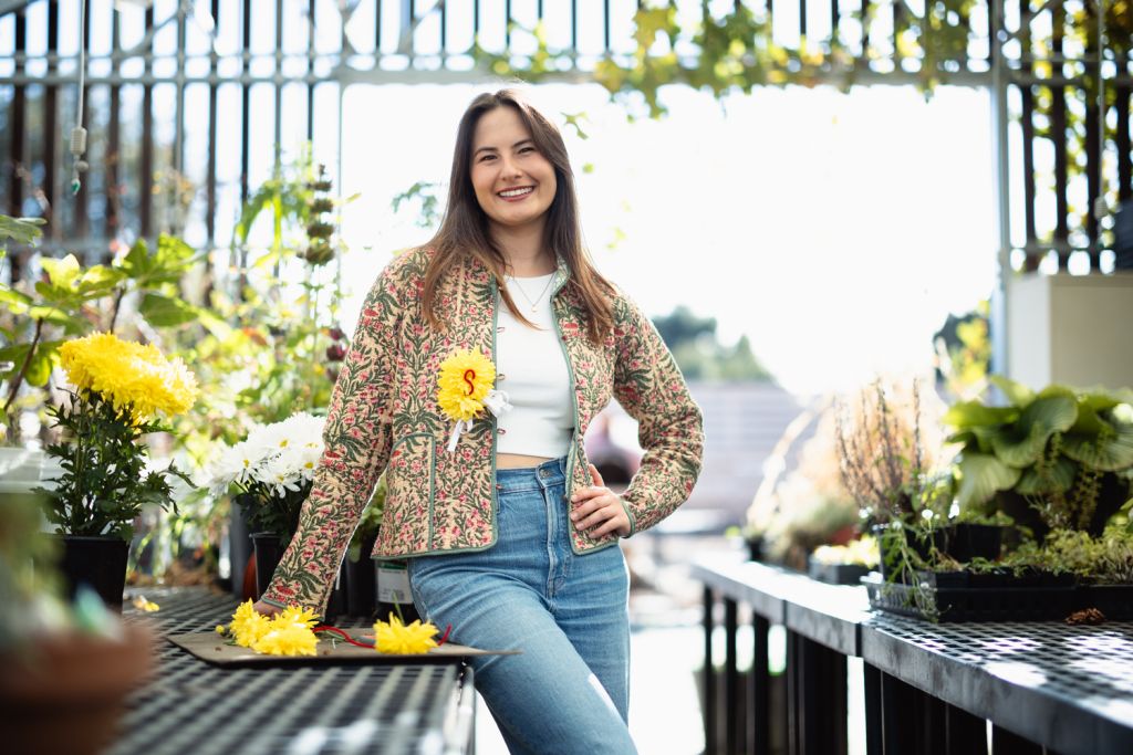 Senior Sydney Kaminski is bringing back floral corsages, which were popular fashion accessories that students wore to Big Game a century ago.