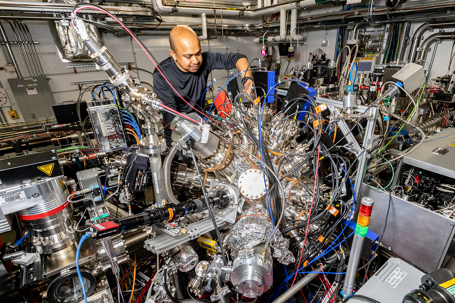 Image of SLAC scientist Razib Obaid working on the MRCO instrument.