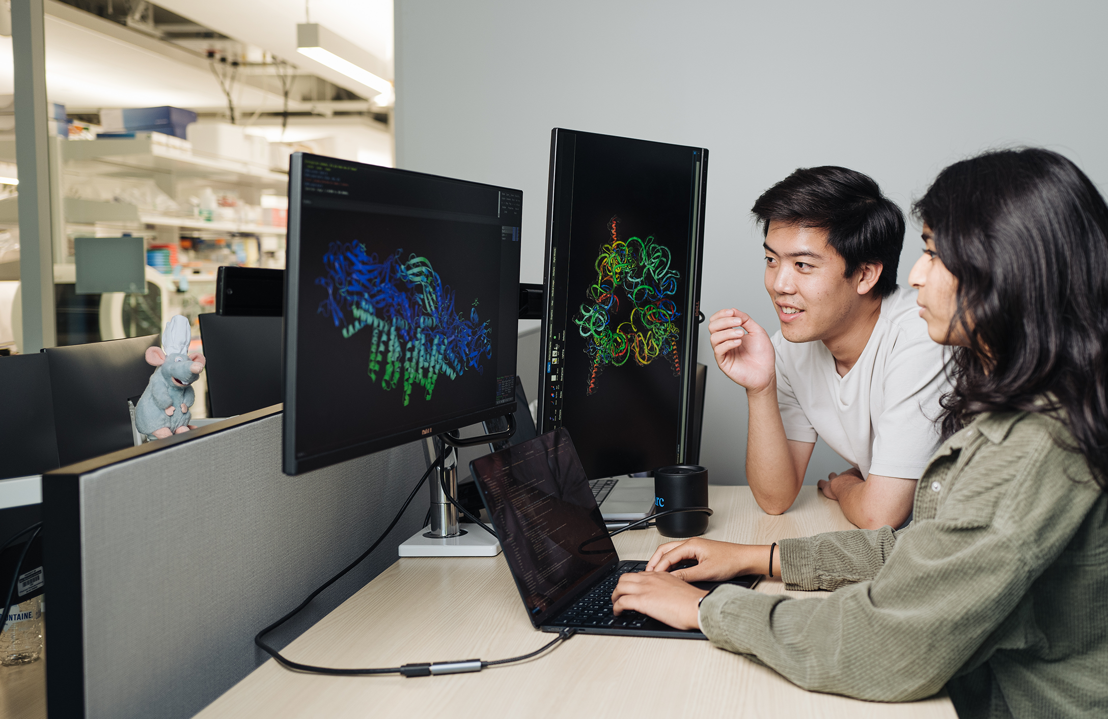 Brian Hie, Aditi Merchant, and Talal Widatalla examine a protein from the West Nile virus