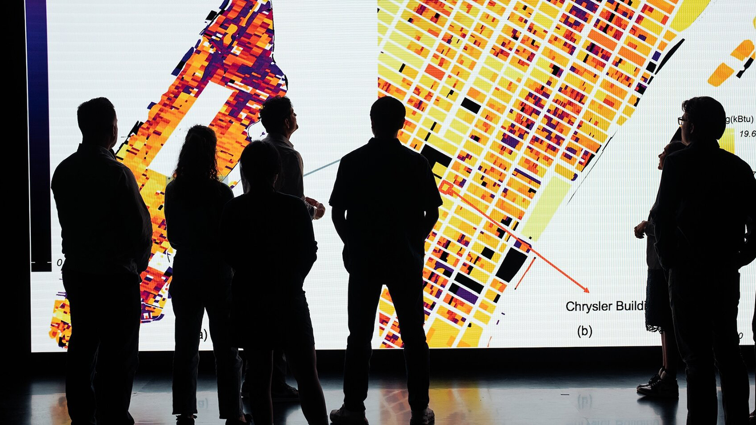 Open video Visitors view a large screen displaying an energy map of New York City. in a modal