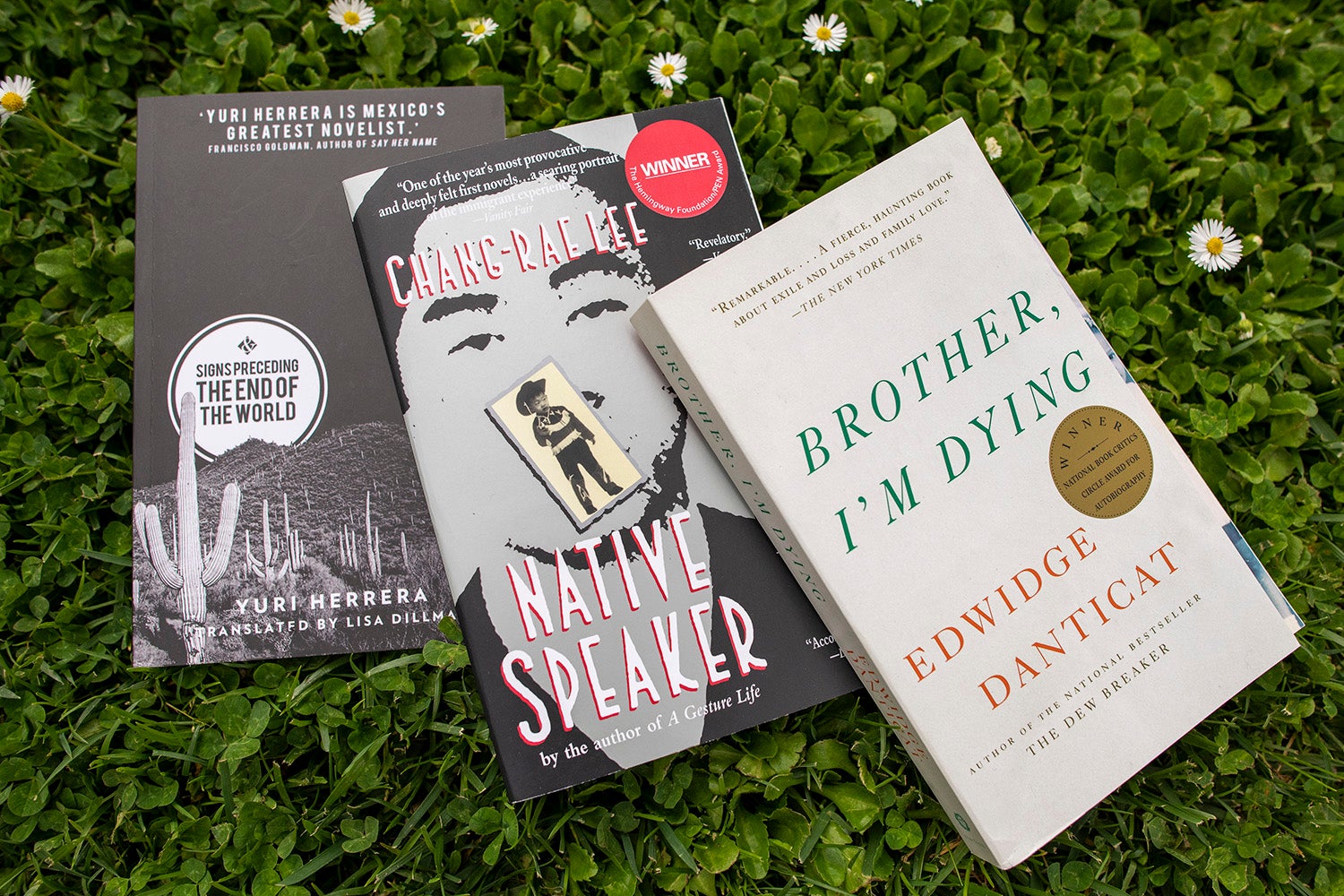 The Three Books of the 2018 summer reading program for incoming students.