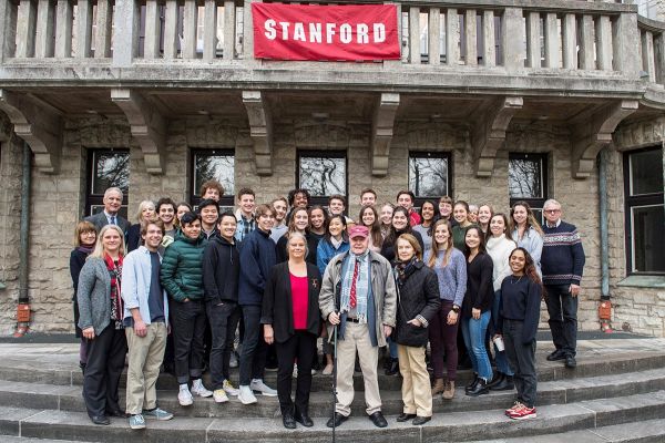 H. George Will (center, with red cap) and his wife, Sigrid (center right), join the students and staff of Stanford’s Berlin program at the H. G. Will Center.