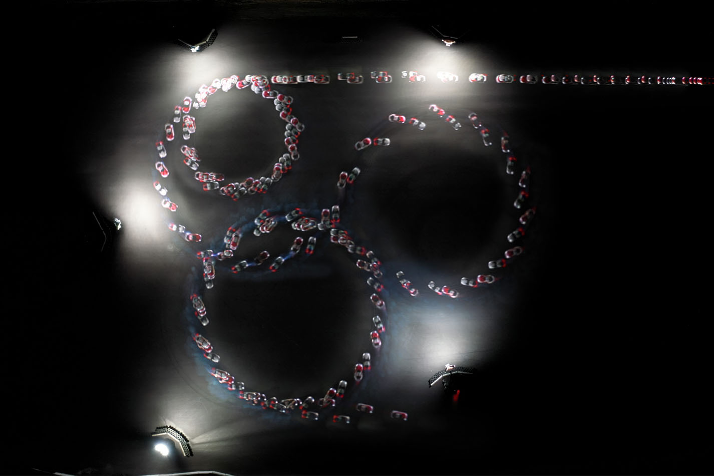 Autonomous vehicles tandem drifting pattern as seen from above.