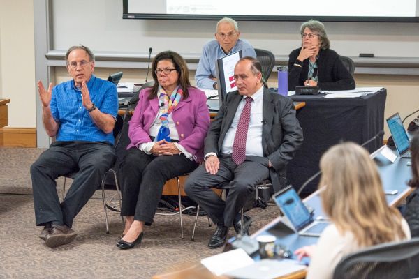 Robert Weisberg, Yvonne Maldonado and Matt Snipp at the faculty senate