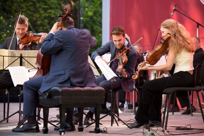 The quartet seated and performing.