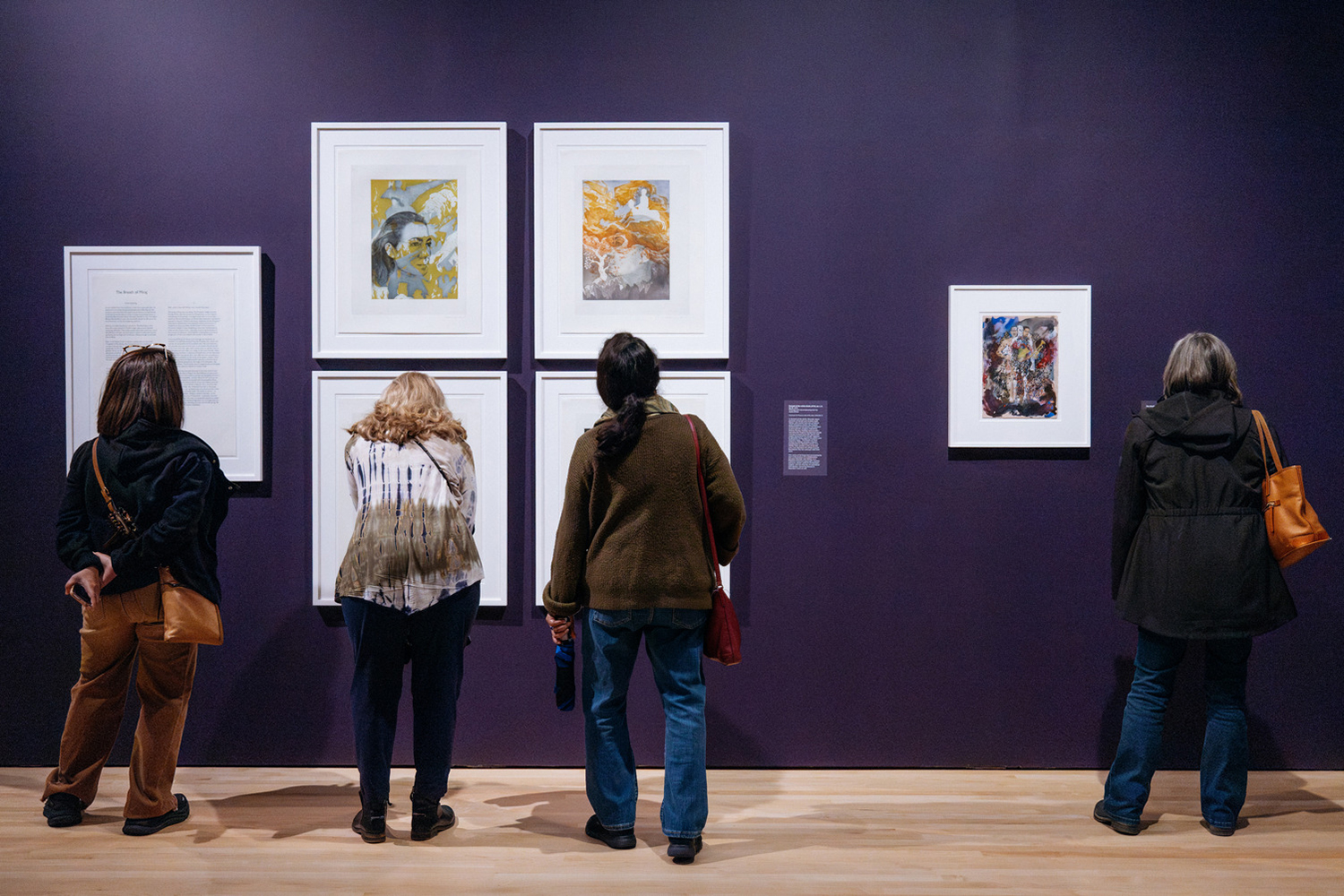 Visitors admire artwork displayed at the Cantor Arts Center.