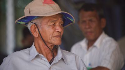 headshot of an elderly Cambodian man