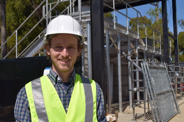 Sebastien Tilmans in front of the William and Cloy Codiga Resource Recovery Center
