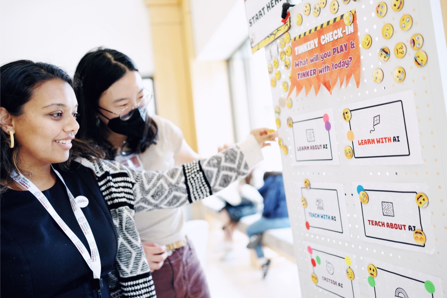 Students at the whiteboard, at Stanford's AI Tinkery space