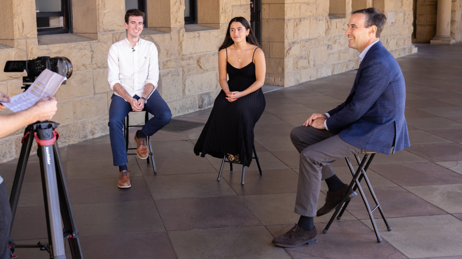 Open video ASSU President Jared Hammerstrom, ’27, and Vice President Celeste Vargas, ’27, sitting down with Stanford President Jonathan Levin on campus in a modal