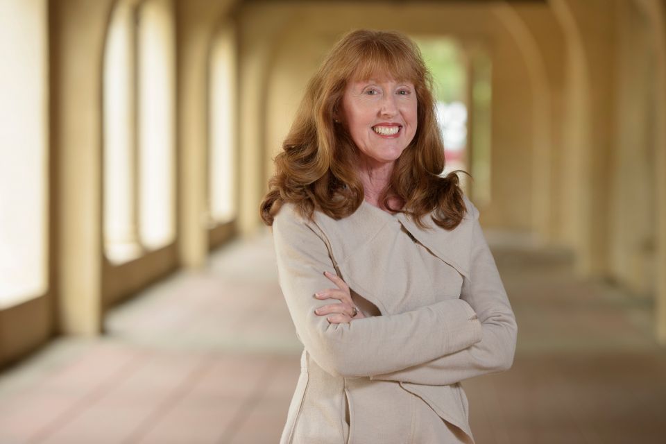 Nancy Lonhart standing in arcade