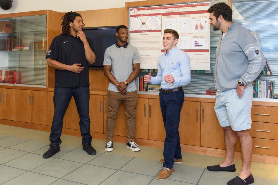 Peter Kalambayi, left, Terrence Alexander, Mason Pengilly, and Erik Lorig