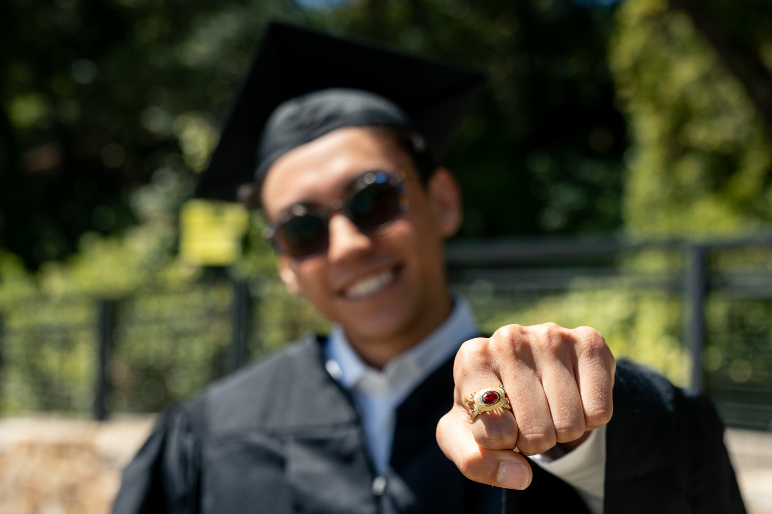 Grad David Durand shows off the class ring he made himself.