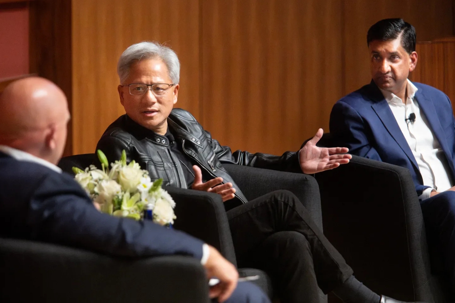 NVIDIA CEO Jensen Huang and Congressman Ro Khanna engaged in discussion on stage.