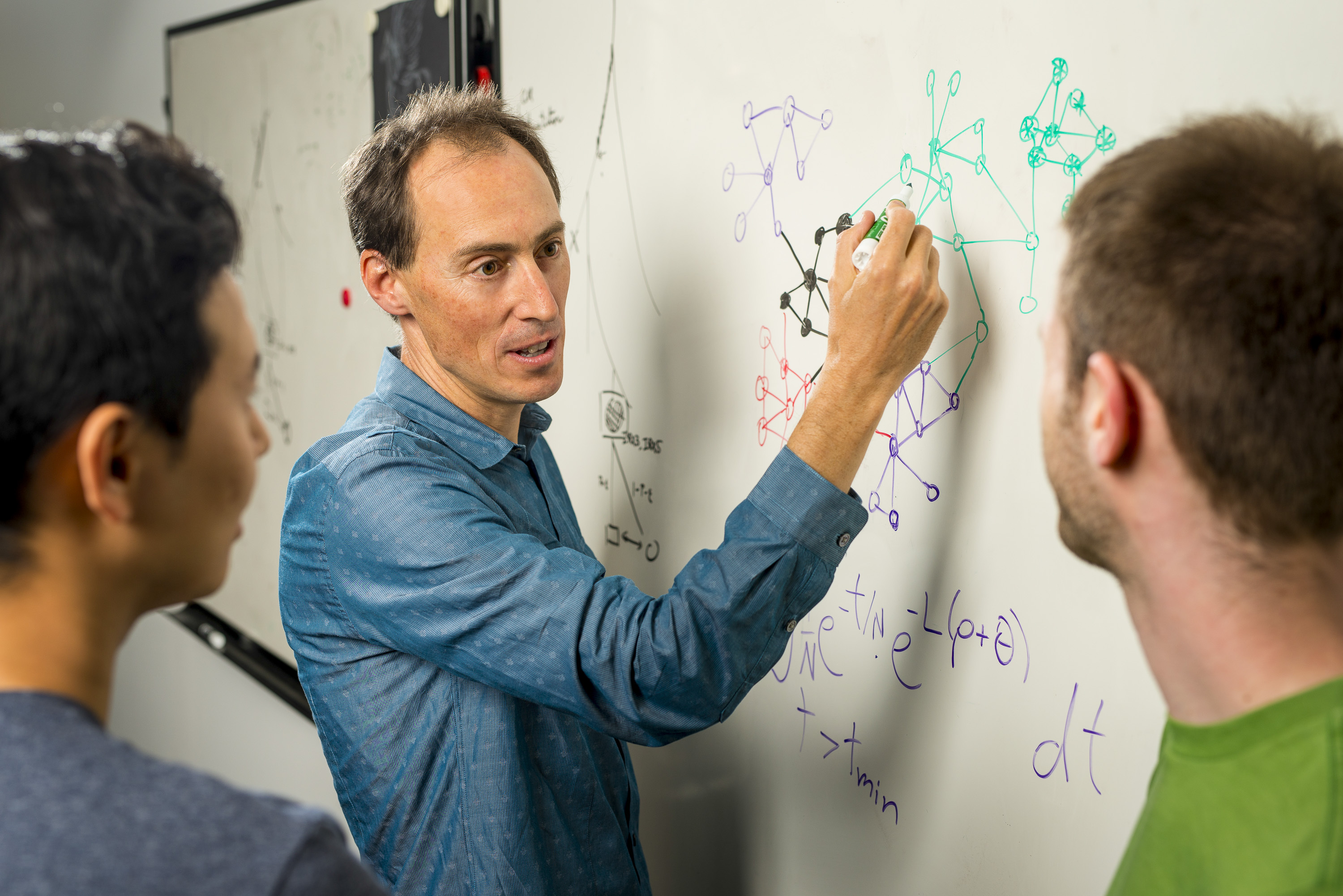 Stanford Professor Jonathan Pritchard at the whiteboard