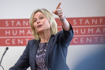 Caroline Winterer with Stanford Humanities Center logo behind her at the lectern