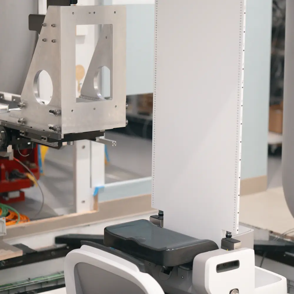 Image of a novel patient positioning system that supports and stabilizes patients to be treated in the upright position.