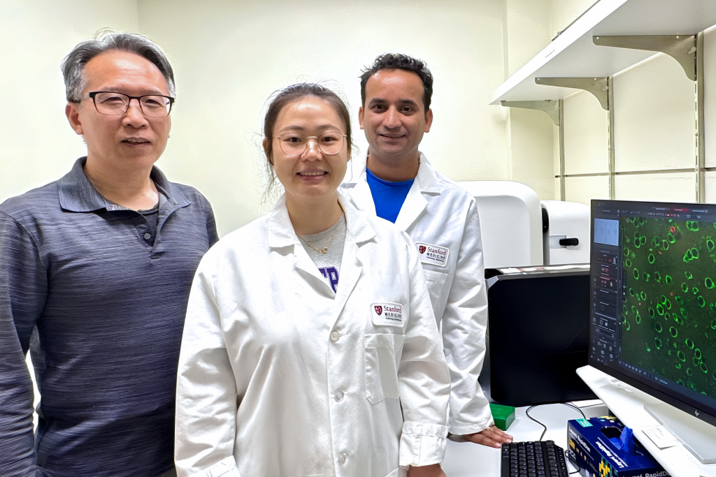 Bingwei Lu, Wen Li, and Suman Rimal in the lab