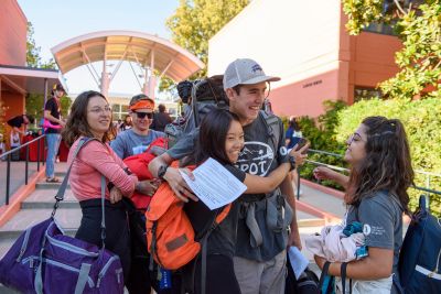 Students who participated in the Stanford Pre-Orientation Trip arrive at Stern Hall.