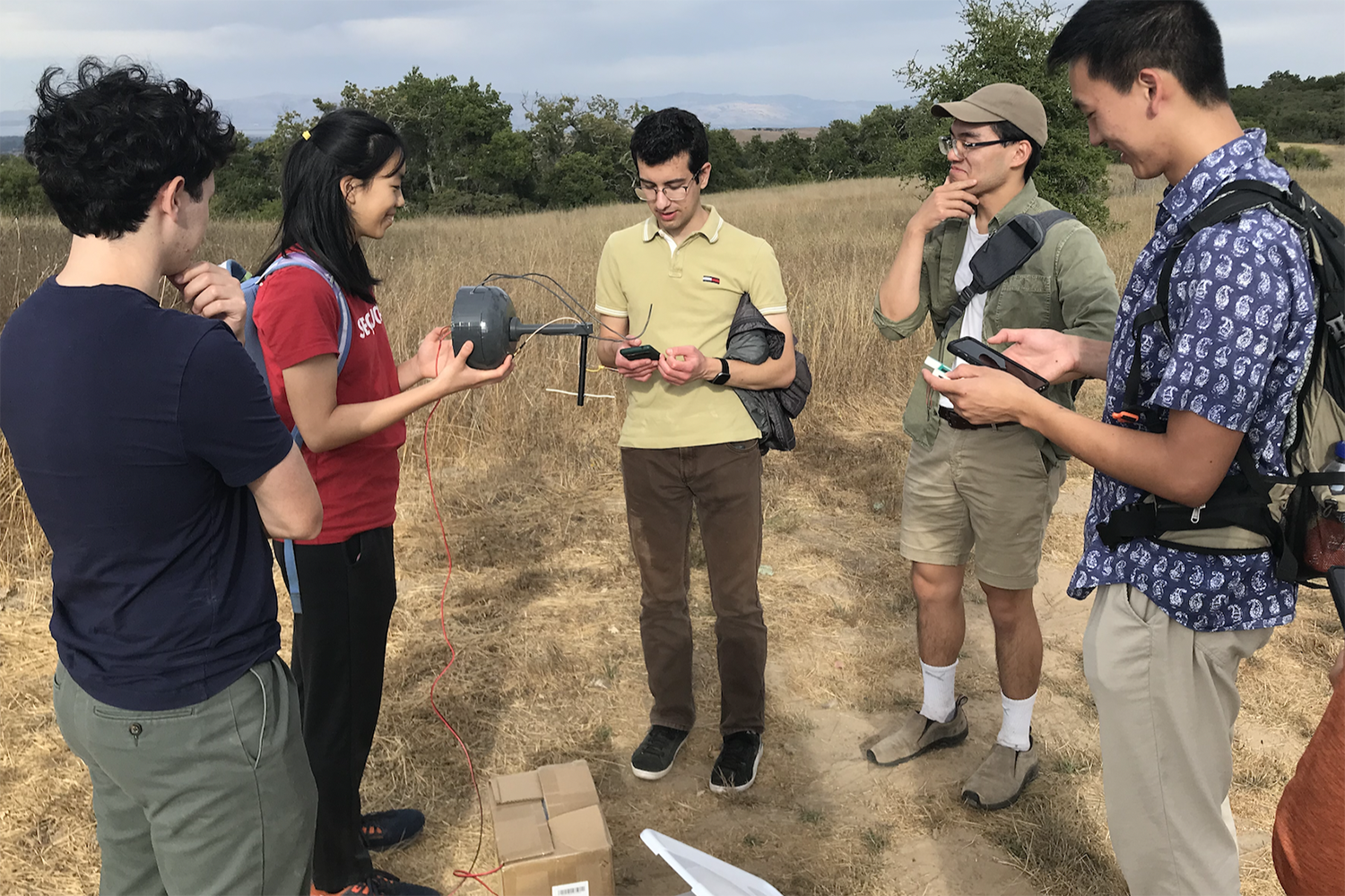 A photo of the SMesh team conducting field tests of the sensors at Jasper Ridge.