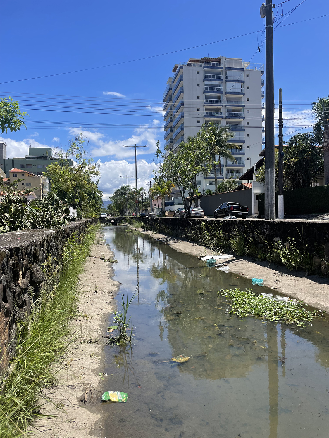 An image of urban landscape with a waterway running through it.