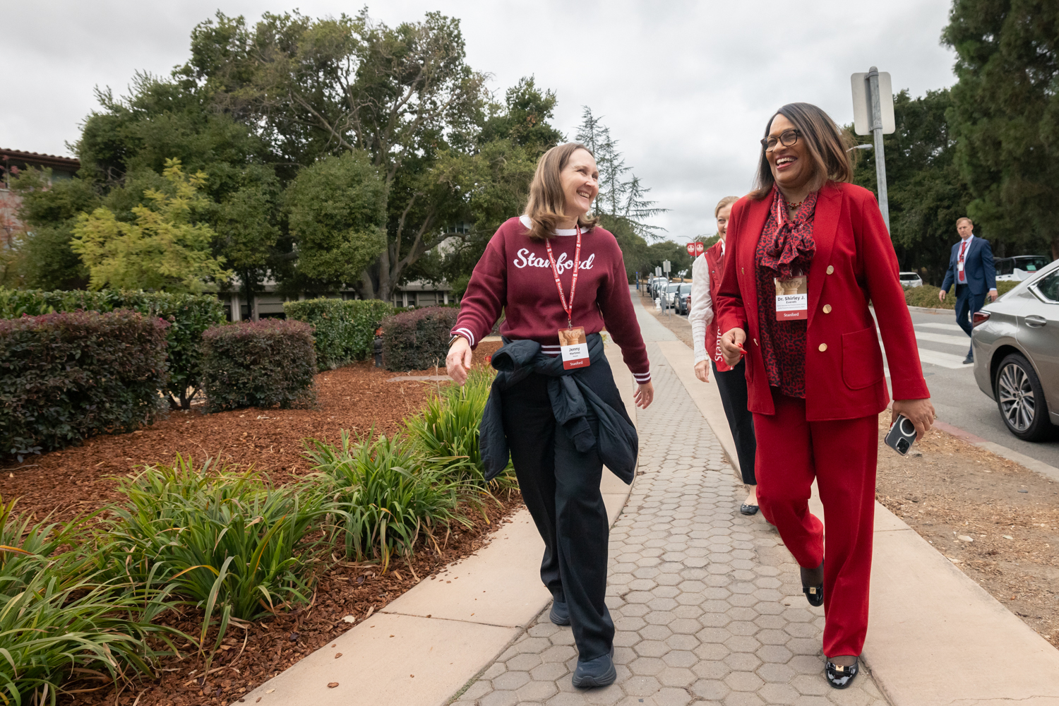 Members of Stanford's Residential and Dining Experience team arrive at New Student Orientation wearing cardinal red.