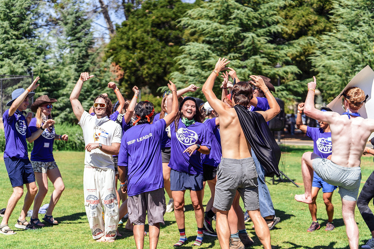 Students dancing on Roble Field as part of pre-trip activity.
