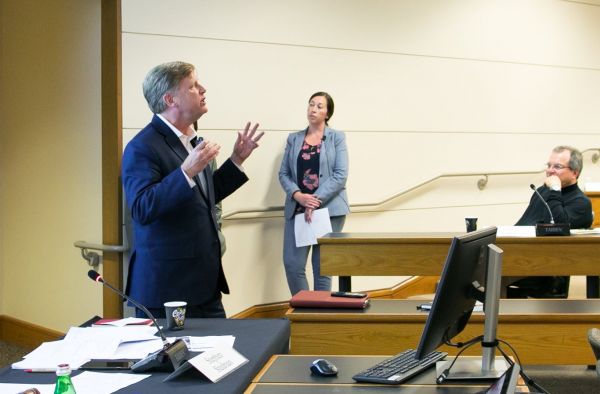 Michael McFaul standing before the auditorium