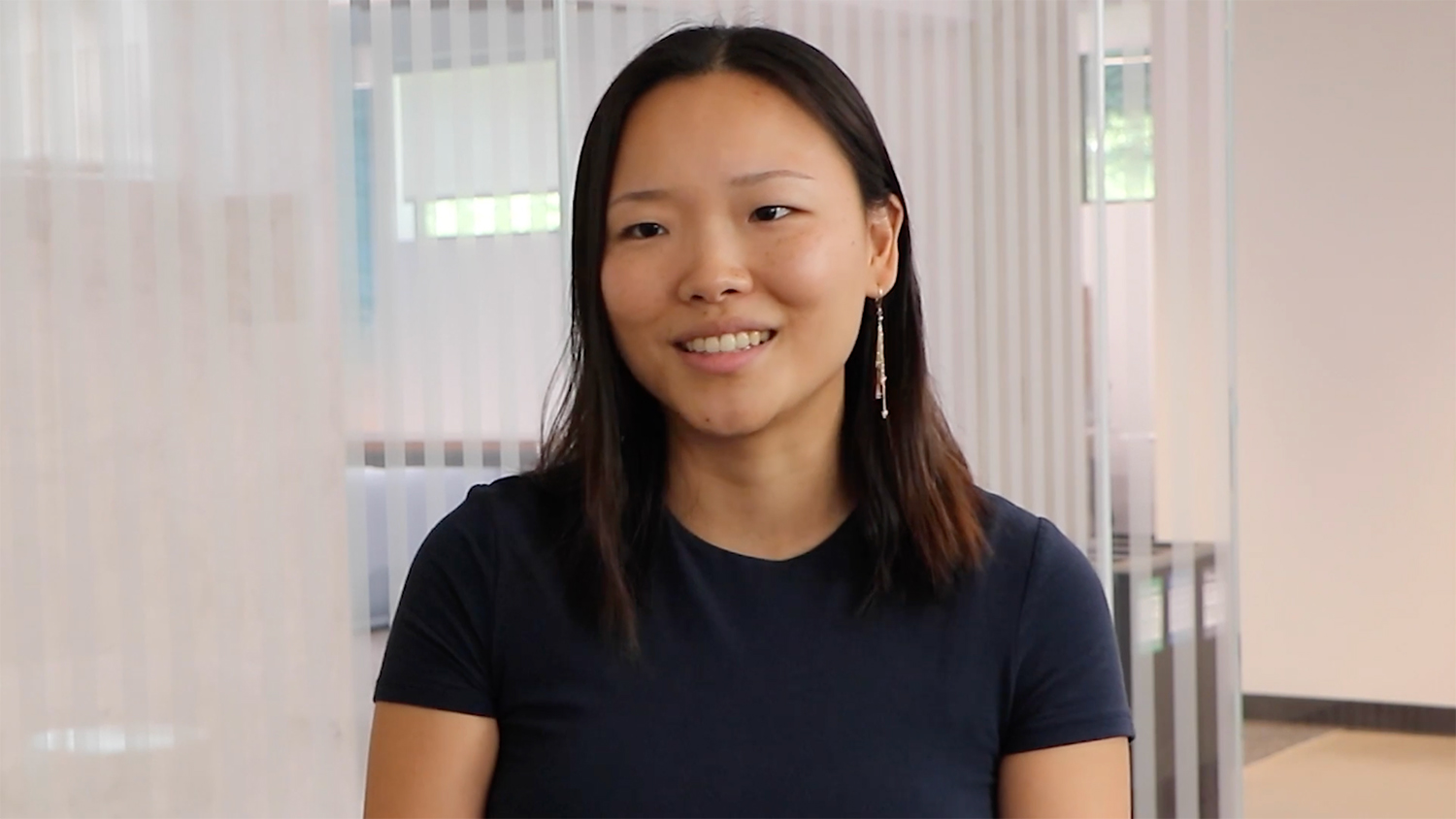 A screenshot of Lucia Jiang talking about the Paul Lomio Veterans Legal Assistance Program.