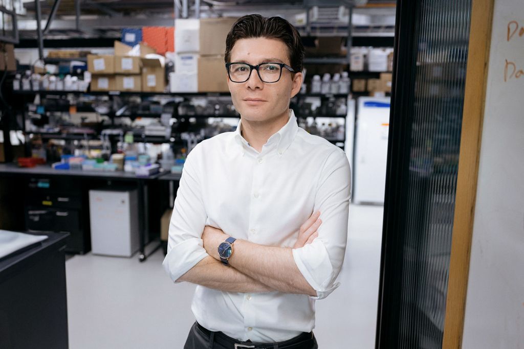 Profile photo of Sergui Pasca standing in his lab.
