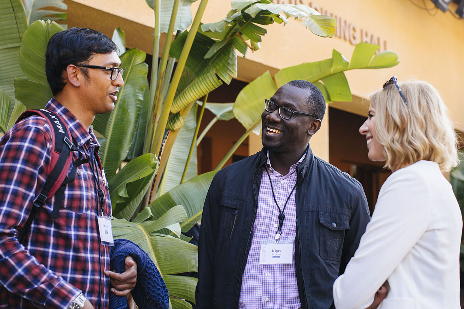 Image of three people in the LEAD program talking outside.