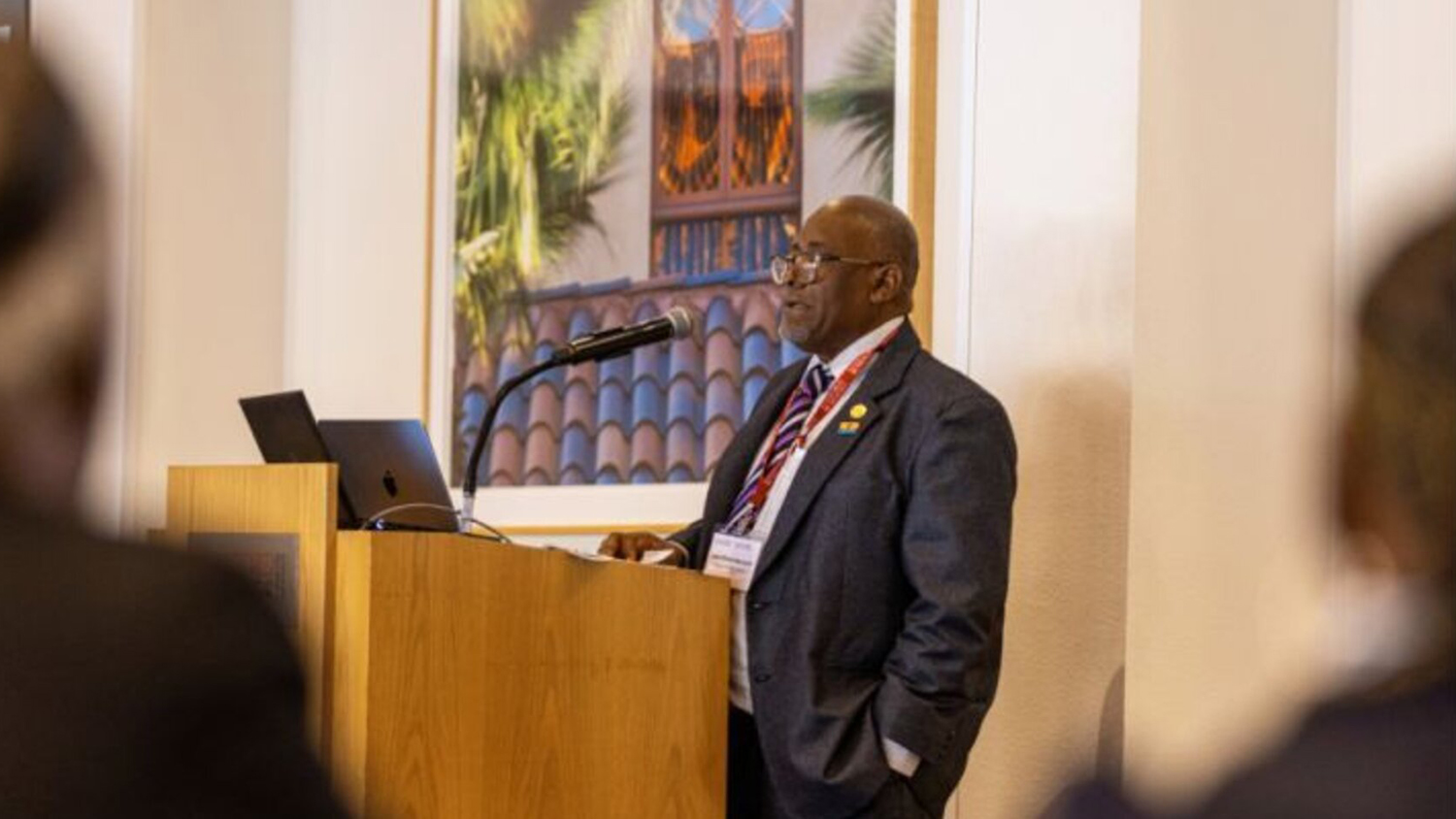 Image of Olivier Bancoult speaking to attendees at the 2025 Stanford Oceans Conference during a keynote address.