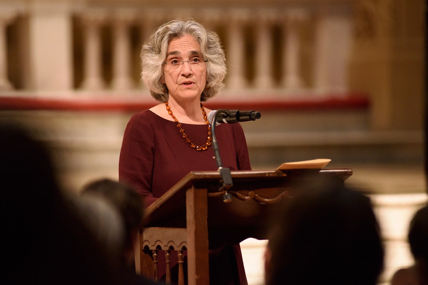 Persis Drell at lectern in Memorial Church during Inauguration Day community gathering