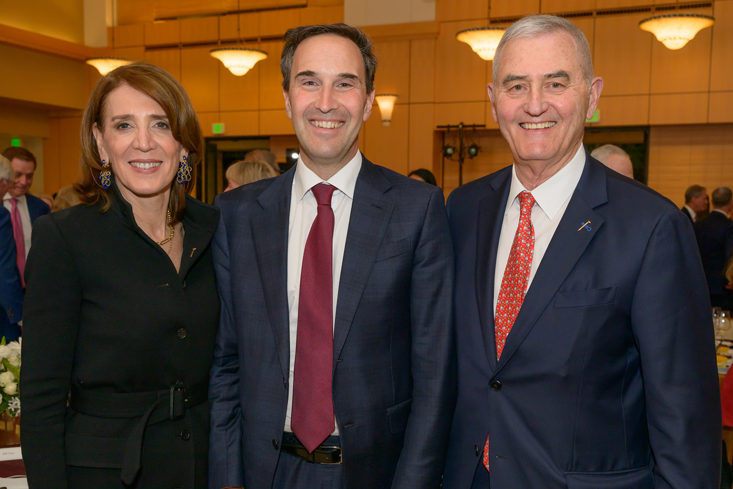 Gold Spike award recipients Ruth Porat (left) and Ron Spogli (right) with President Jon Levin