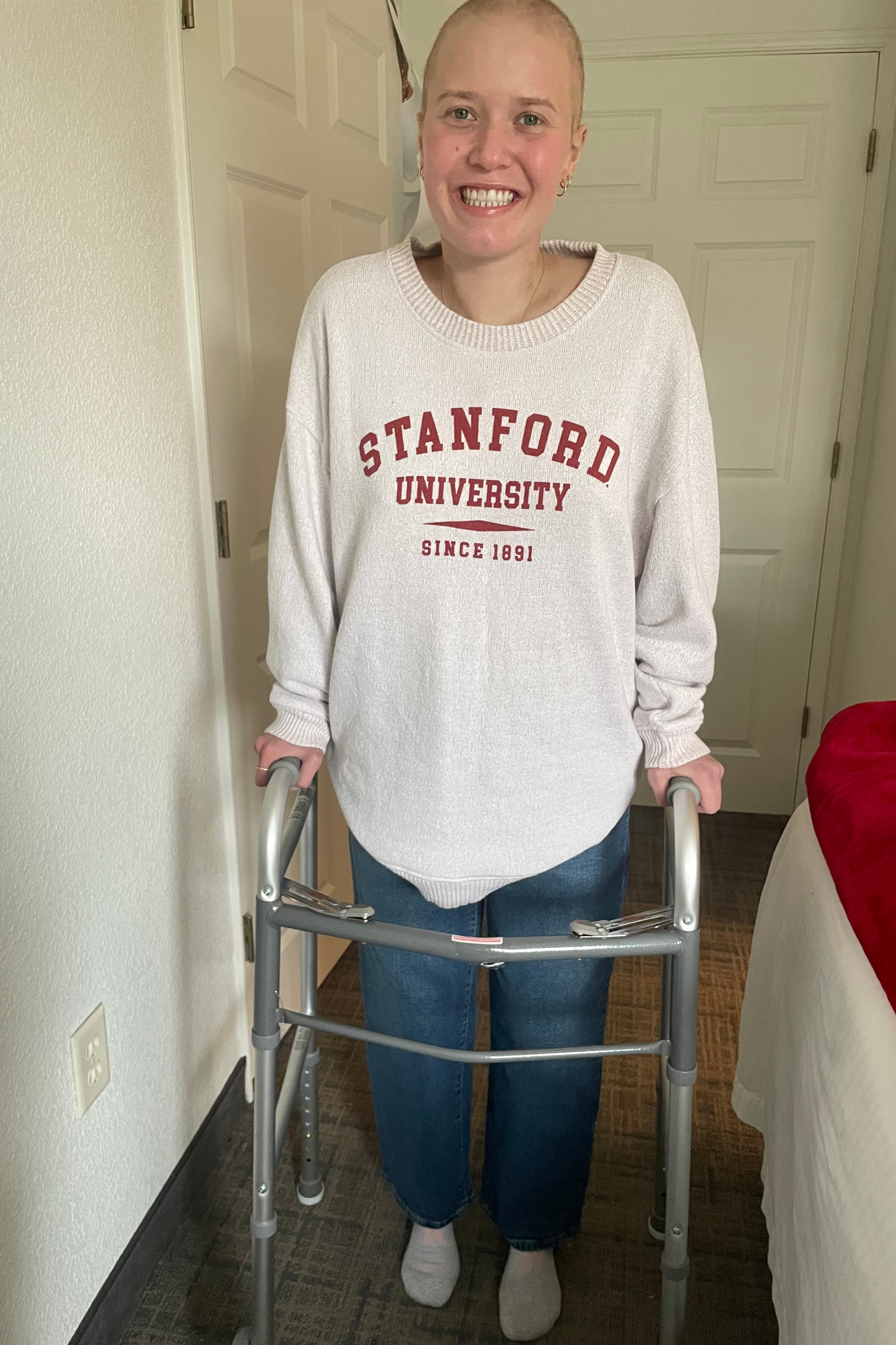 Josie Fabian with her walker and wearing a Stanford sweatshirt