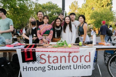 Students staffing the Hmong Student Union table