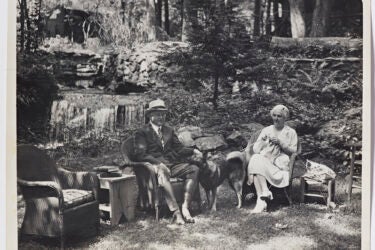 Herbert and Lou Henry Hoover with their dog, Weegie, at their presidential getaway, Rapidan Camp in Shenandoah National Park in Madison County, Virginia, Aug. 19, 1932.