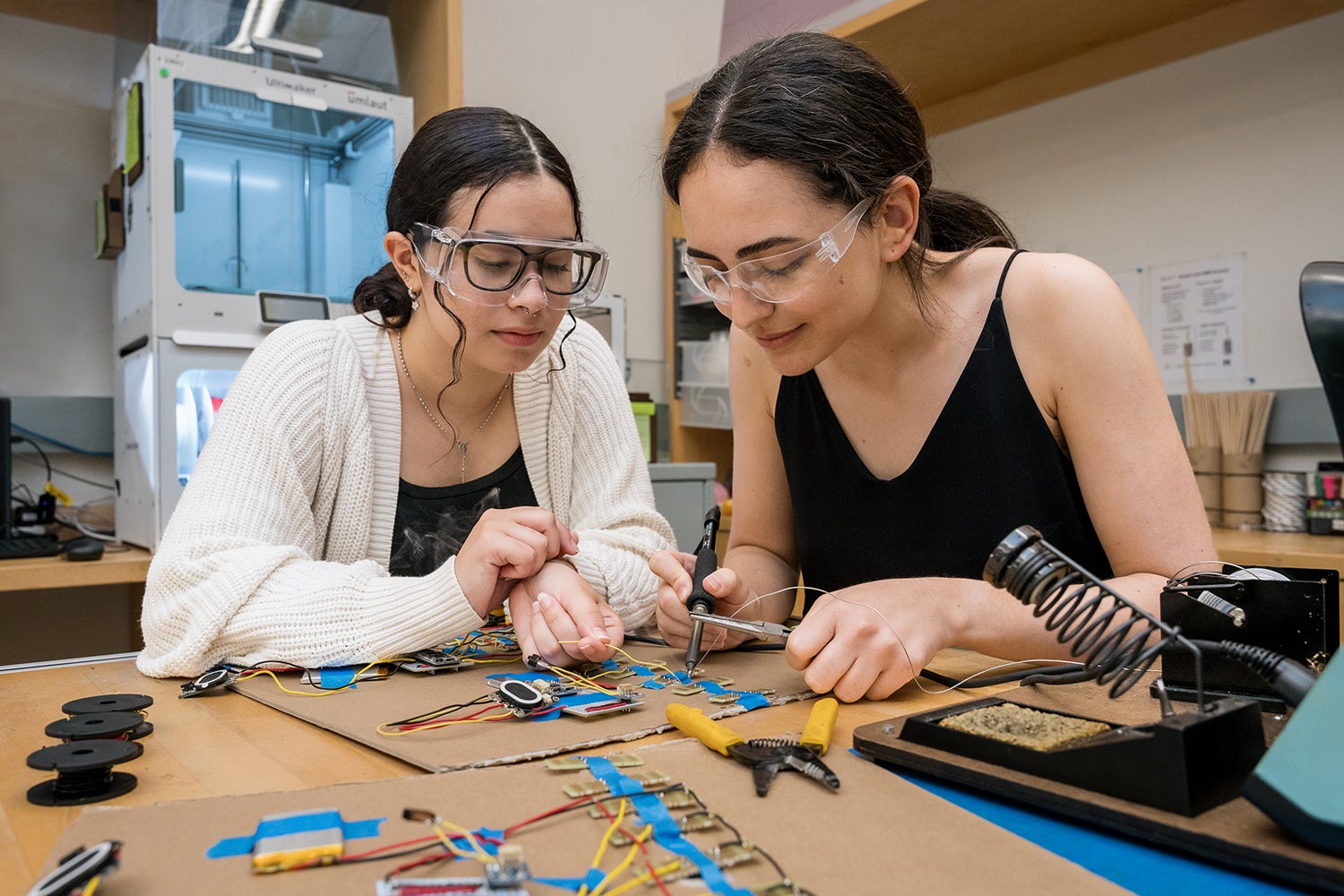 RAISE fellow Aya Mouallem (right) explores new ways for engineering students with blindness or low vision to simulate circuits and collaborate with their lab colleagues.