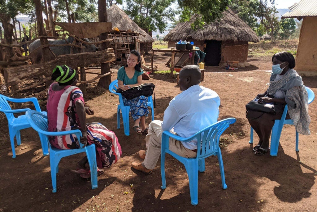 Stanford researcher Christine Pu interviews residents of rural Uganda to understand local perceptions and definitions of poverty