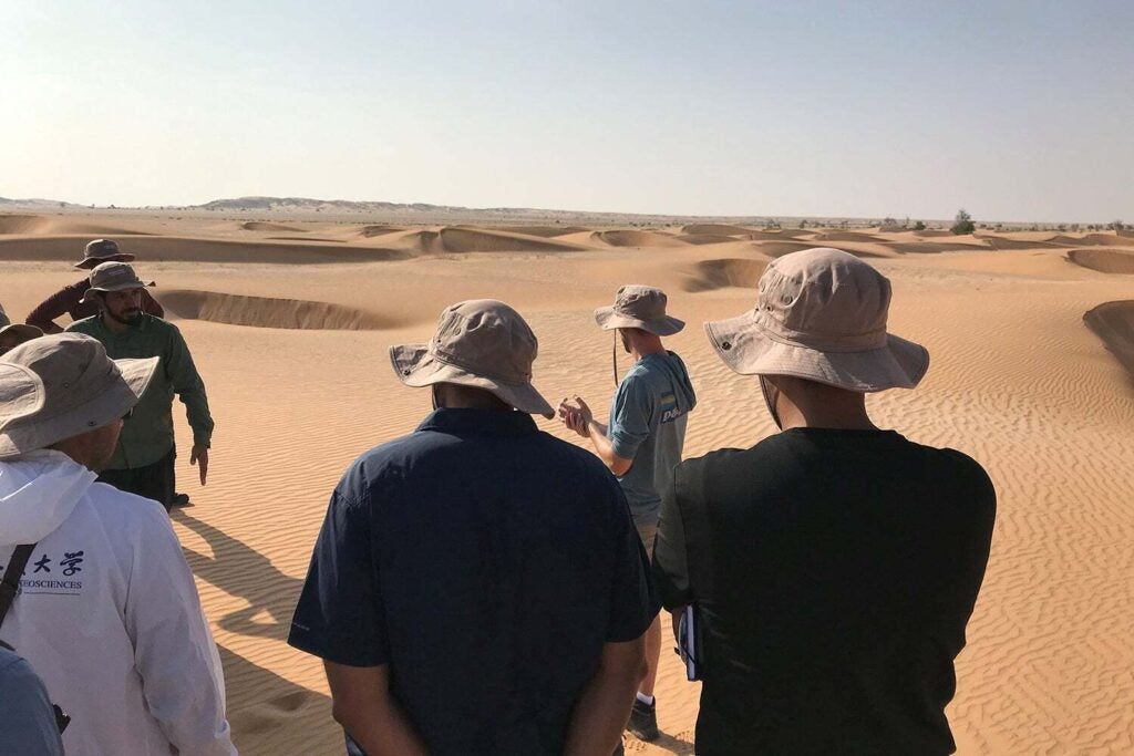 Geoscientist Mathieu Lapôtre (center) in Oman, just a few hundreds of kilometers away from one of the Dune filming locations near Abu Dhabi.