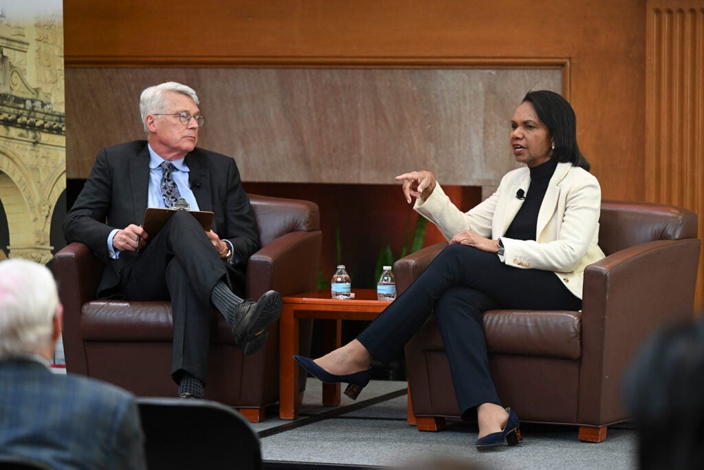 Professor Condoleezza Rice participates in a Q&A moderated by Professor Scott Sagan, left, at Bechtel Conference Center on Tuesday, March 12, 2024.