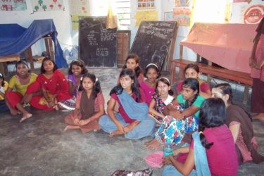 Girls attending the workshop participate in a roundtable discussion.