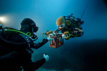 Robot and human underwater