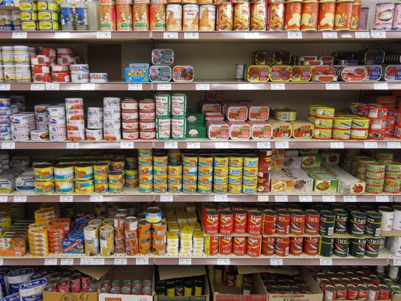 canned food on supermarket shelf