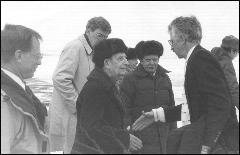 Siegfried Hecker greets Russian physicist Yuli Khariton in 1992.