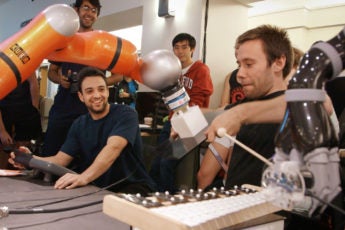 Stanford students and their robots