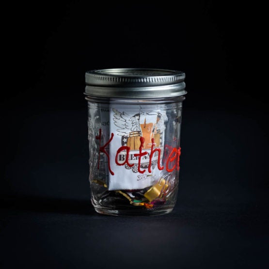 Mason jar filled with mementoes