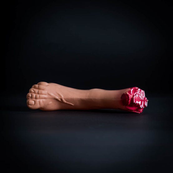 Plastic bloody severed foot