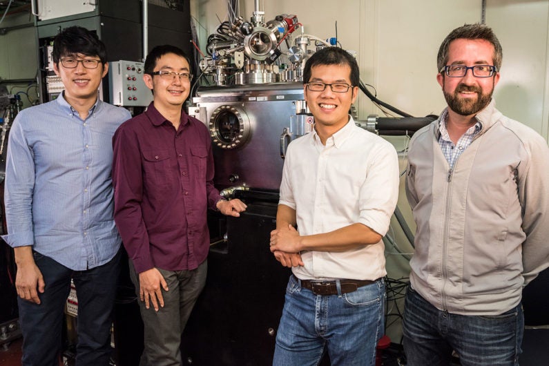 Jongwoo Lim, Yiyang Li, and William Chueh of Stanford and SLAC National Accelerator Laboratory and David Shapiro of Lawrence Berkeley National Laboratory stand in front of the X-ray microscope at the Advanced Light Source. 